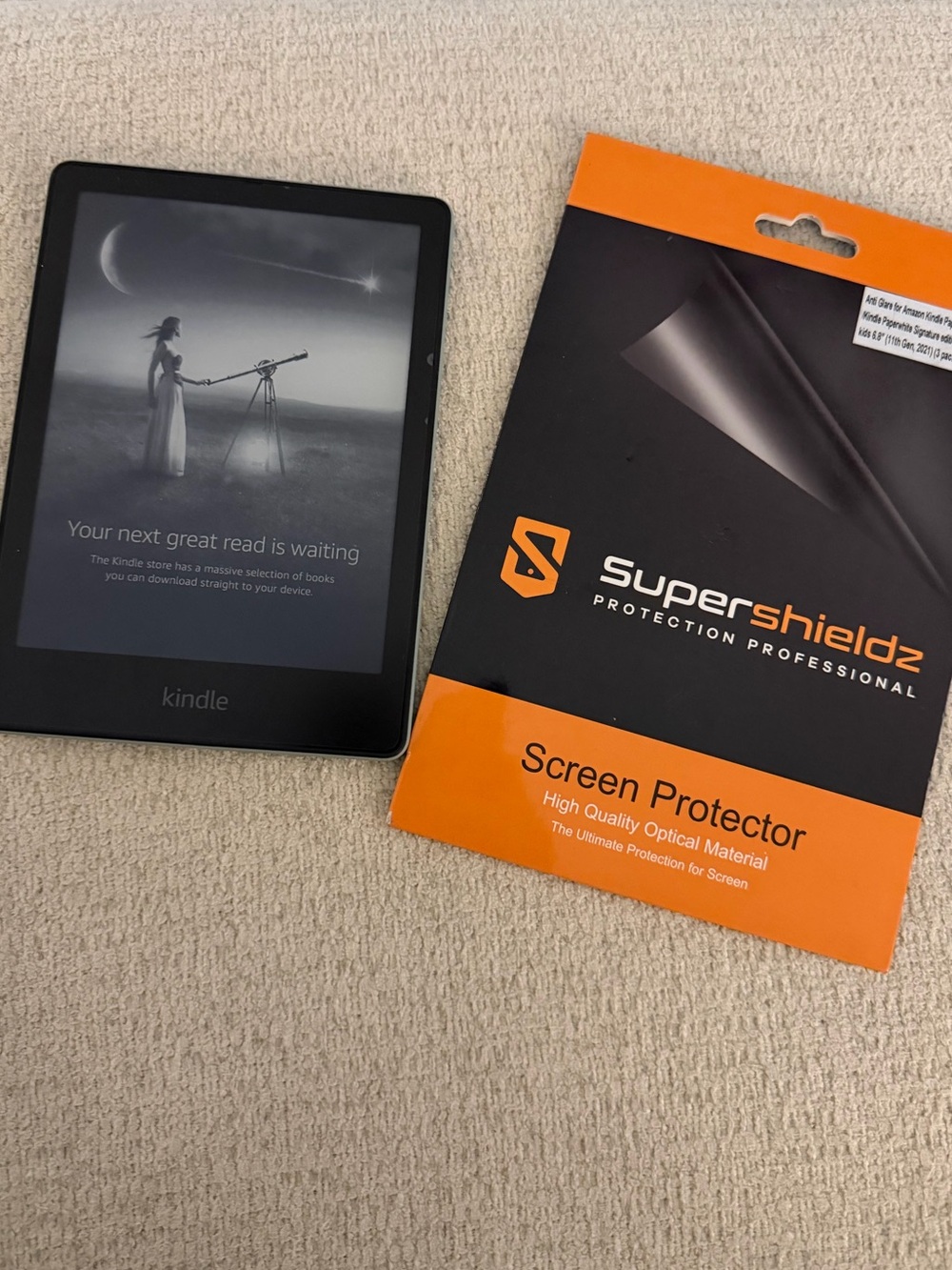 Kindle E-Reader with Black Finish + Orange SuperShieldz Screen Protector
